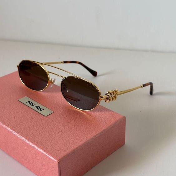Miu Miu Travel Sunglasses